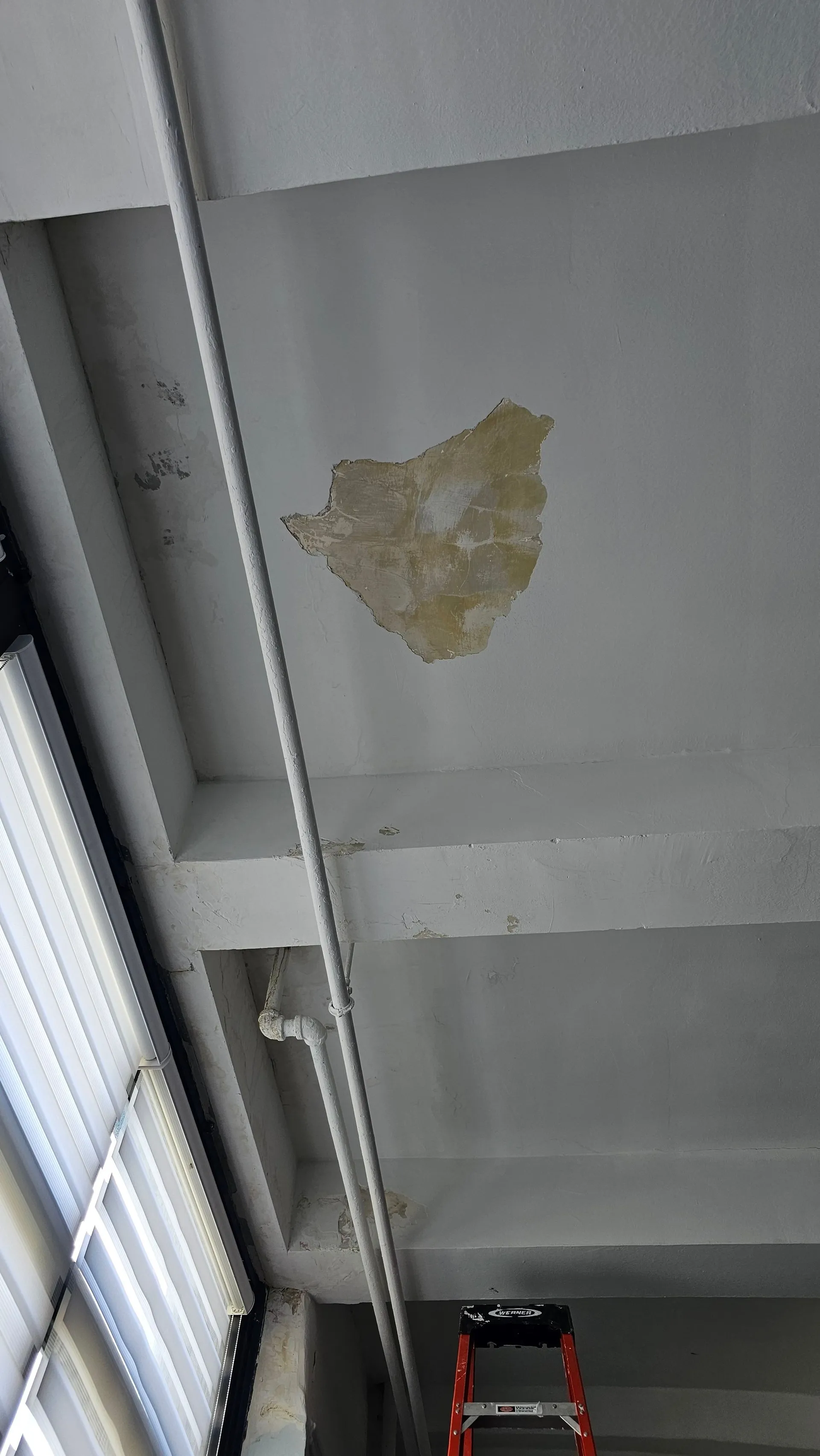Ceiling-damage assessment during a verified construction process