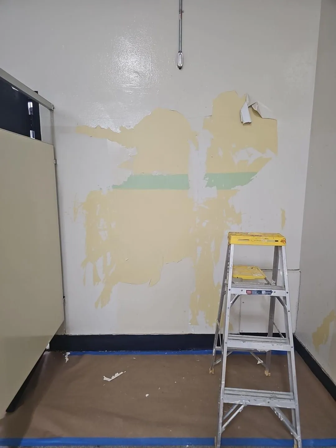 Wall-prep restoration detail during a verified construction process